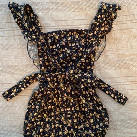 12 month romper. Navy with tan floral pattern. Adjustable straps. - Picture 4 of 5